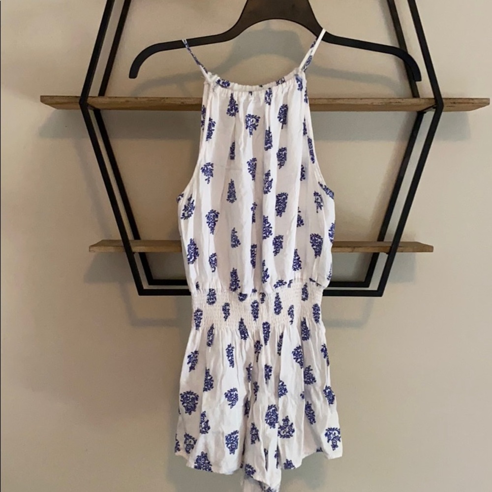 White and blue pattern romper
